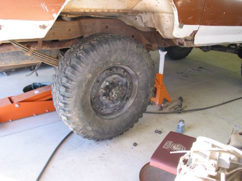 1981 Ford Bronco - Hummer rim waiting for its turn to be refinished. That's a 35 inch tire.