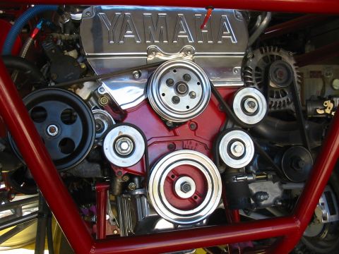 1993 Ford Taurus - Close-up of a Yamaha engine, showing the intricate pulley and belt system.
