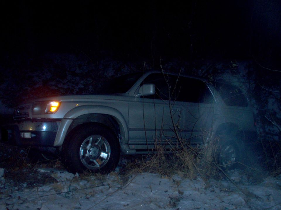 A friend's 2Runner that spun a few times on ice & backed into this ditch.  It came out easily with my winch.