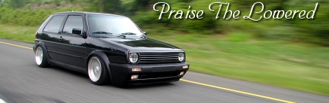 1994 Volkswagen Jetta - Black Volkswagen Golf Mk2 with lowered suspension on the road.