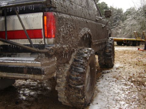 1989 Ford Bronco - This 1989 Ford Bronco is heavily covered in mud and ice, with icicles hanging from its frame and body panels.