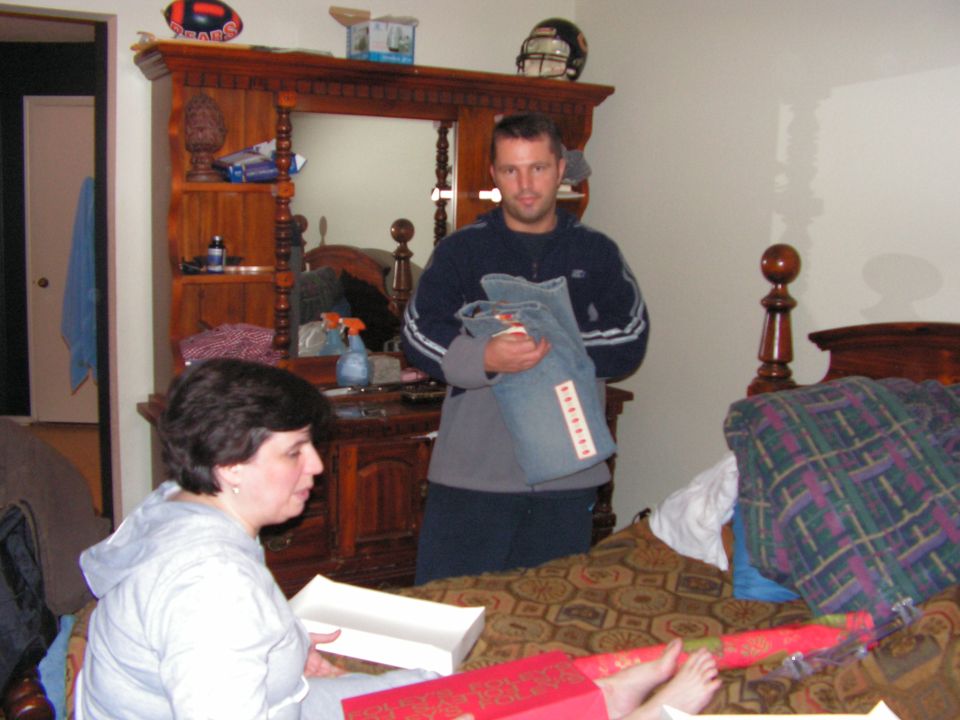 Margaret wrapping presents for Rich.