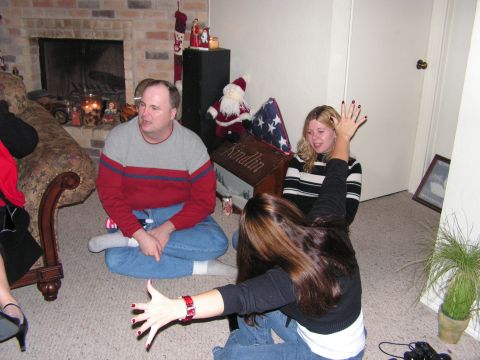 1978 Ford Bronco - A group of people are gathered in a living room, possibly during a holiday celebration.