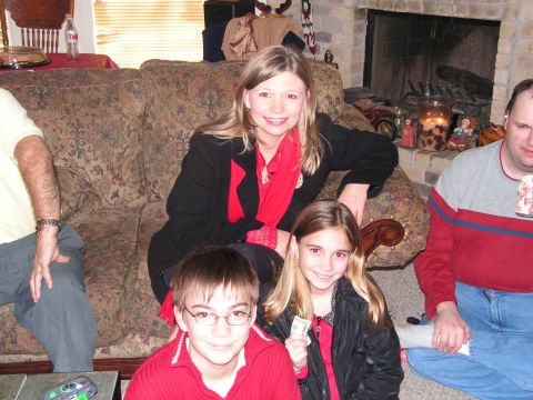 1978 Ford Bronco - Family members gathered in a living room, possibly for a holiday celebration.