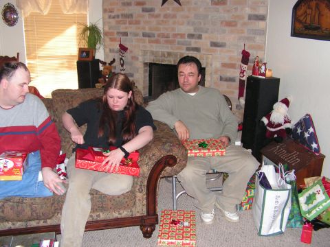1978 Ford Bronco - A family gathers to open gifts during the Christmas holiday season.