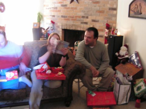 1978 Ford Bronco - Christmas morning gift opening scene with people on furniture.