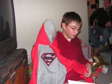 1978 Ford Bronco - A young person is shown holding a Superman hoodie while another person sits in the background.
