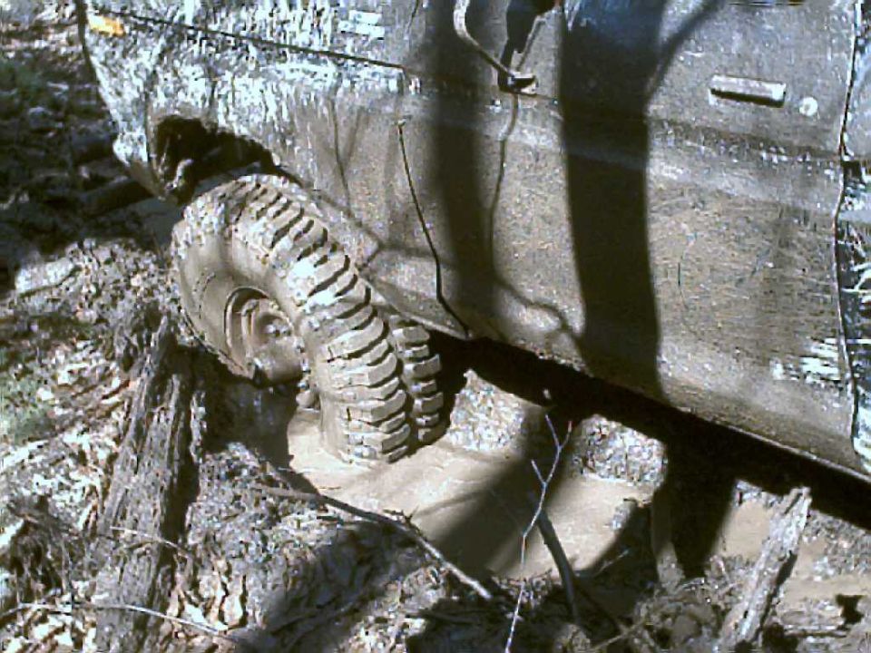 1978 Ford F-250 wheel stuck in mud