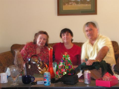 1978 Ford Bronco - A family gathers for the holidays, with festive decorations and drinks on the coffee table.