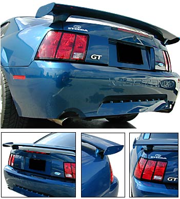 2002 Ford Mustang - Rear view of a blue Ford Mustang GT, showing its distinctive taillights and spoiler.