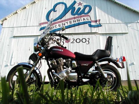 1985 Ford LTD Crown Victoria - Suzuki GSX motorcycle in front of an Ohio Bicentennial barn.