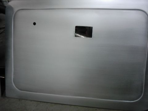 1978 Ford Bronco - This is a close-up view of a vehicle's door panel, showing its basic construction without any trim or accessories.