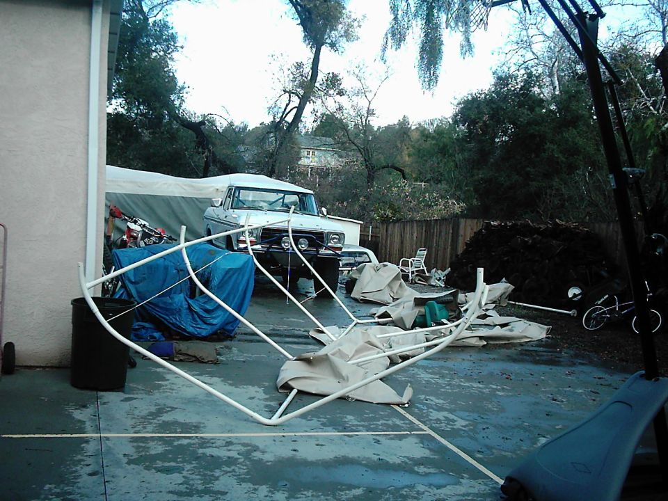 White 1973 pickup truck front view with aftermarket bumper and lights