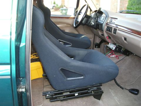 1996 Ford Bronco - Aftermarket racing seats are installed in the interior of a 1996 Ford Bronco.