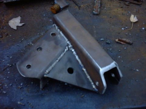 1995 Ford Bronco - It uses the two of the same holes as the steering box.