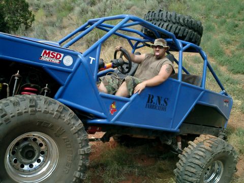 1979 Ford Bronco - Custom blue buggy with a full roll cage and B.N.S. Fabrication markings is ready for off-road adventure.