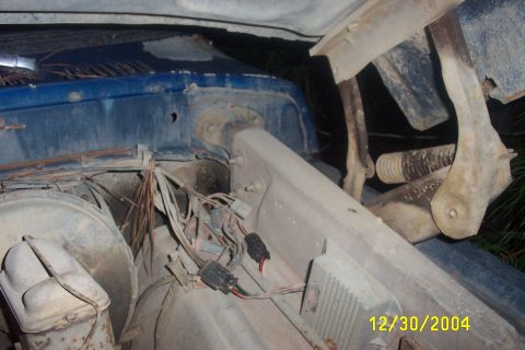 1979 Ford F-150 - The engine bay of a vehicle, showing wiring and mechanical parts, with a date stamp of December 30, 2004.