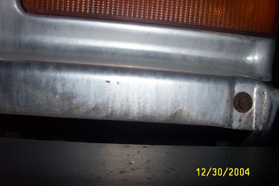 Chrome bumper section with amber turn signal light