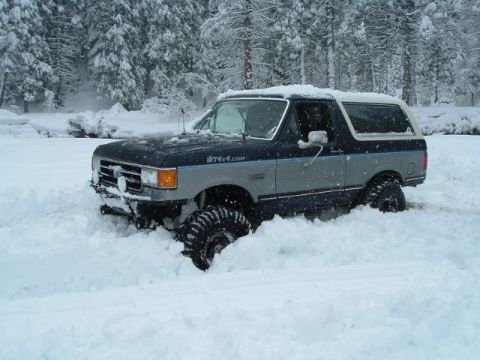 1989 Ford Bronco - you can only see my tires on this side because the snow is all torn up. there was easily 3' of snow on this meadow we found.