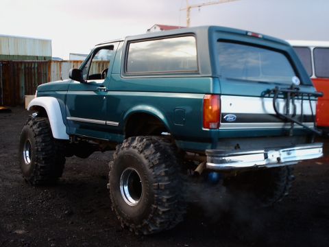 1996 Ford Bronco - Modified Ford Bronco with oversized tires and a custom rear bumper.