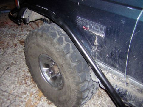 1995 Ford Bronco - Close-up of a 1995 Ford Bronco XLT fender flare and tire.