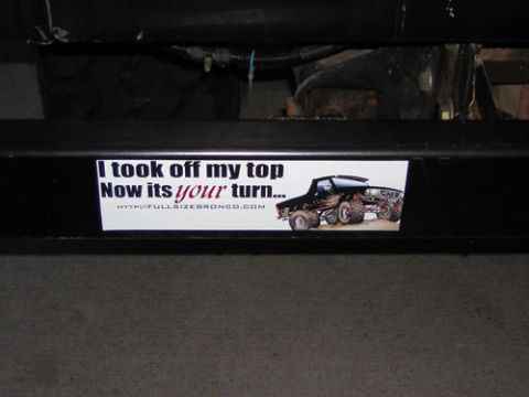 1995 Ford Bronco - Bumper sticker shows lifted trucks and text about removing the top, with a website URL.