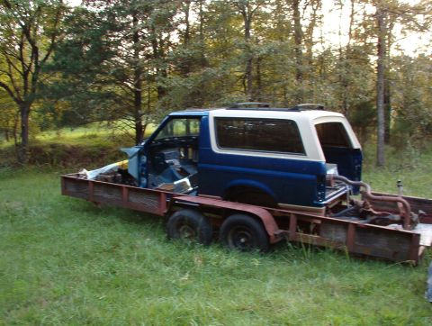 1996 Ford Bronco - SOLD Body tub, title, & camper shell. Frame & trailer for sale as-is. The loose parts inside are also for sale.