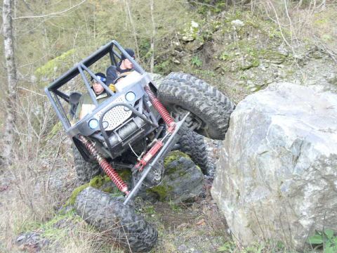 1978 Ford Bronco - This custom buggy navigates a challenging rocky obstacle on an off-road trail.