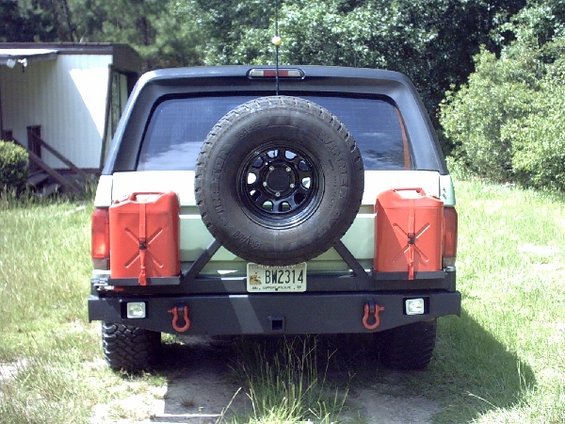 Spare tire and fuel cans installed.