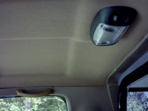 1994 Ford Bronco - Mustang interior light and Explorer grab handle (seen in back ground) installed. This light is a direct bolt in and can be pulled from a mi…