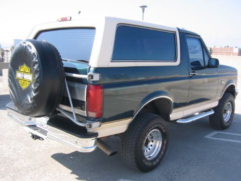 1992 Ford Bronco - This 1992 Ford Bronco features a two-tone paint scheme and a spare tire mounted on the rear.