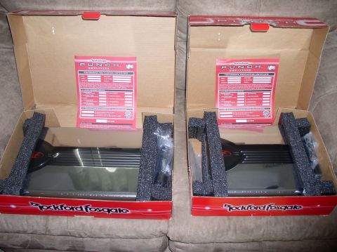 2000 Ford Excursion - Two Rockford Fosgate Punch amplifiers are shown in their boxes with included documentation.