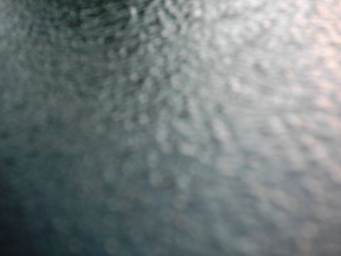 1978 Ford Bronco - A close-up of a textured surface, likely a bedliner, with a website watermark visible.