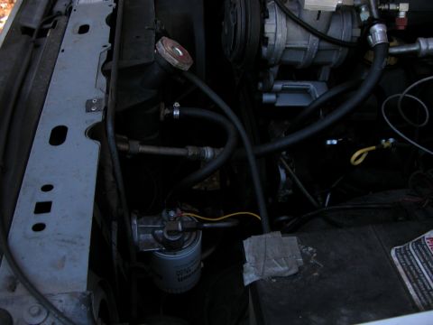 1986 Ford F-350 - Remote tranny filter. Line enters from tranny then into radiator then through dual tranny coolers.