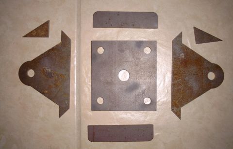 1991 Ford Bronco - Parts for the new spring plates. All parts were water jet cut by Rapid Creek Cutters in Inkon, Indiana. Patrick Burrington is the owner and…