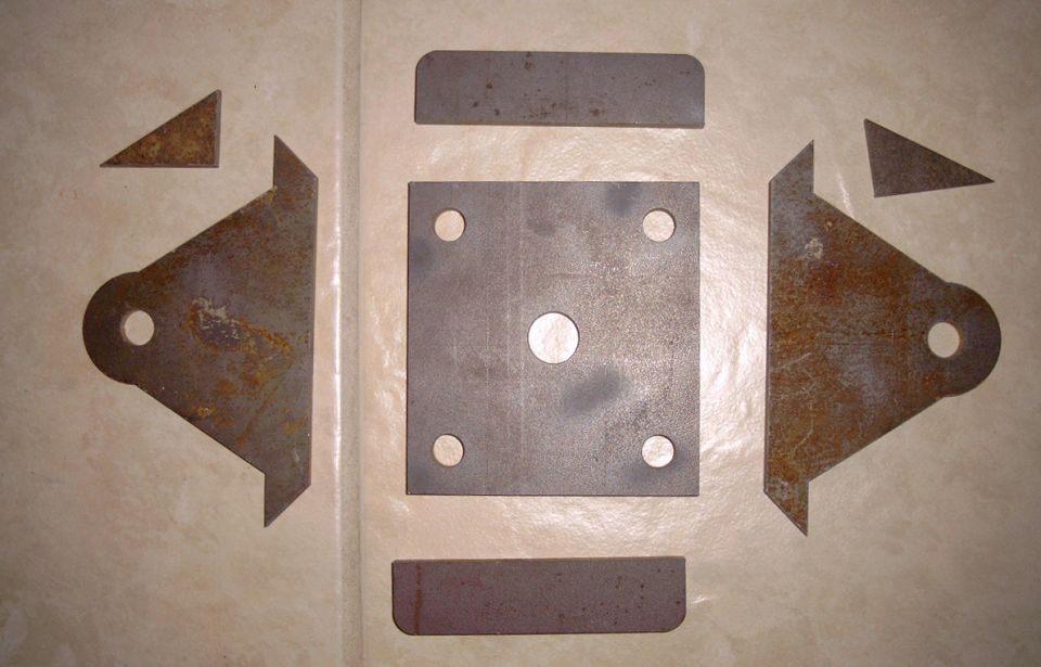 Parts for the new spring plates. All parts were water jet cut by Rapid Creek Cutters in Inkon, Indiana. Patrick Burrington is the owner and their service is to notch.  Their site is www.rapidcreekcutters.com