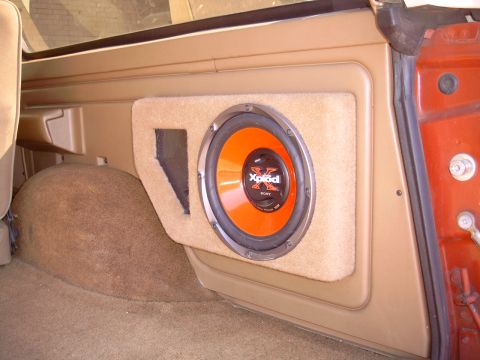 1991 Ford Bronco - Interior panel with a sub-woofer is visible, but no year-specific details are present.