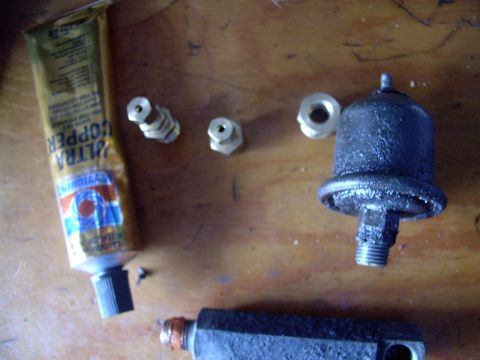 1986 Ford Bronco - I removed the stock pressure sending unit and the extension pipe/log so I could clean the threads, add some sealant and re-clock the positi…