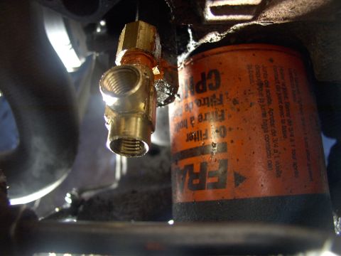 1986 Ford Bronco - Screwing the T fitting to the 90 went just as well.