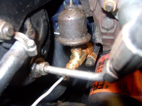1986 Ford Bronco - Here's the oil sender unit back on, along with the new mechanical line.