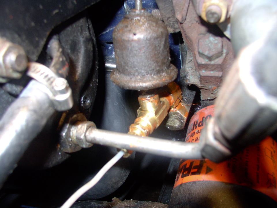 Here's the oil sender unit back on, along with the new mechanical line.