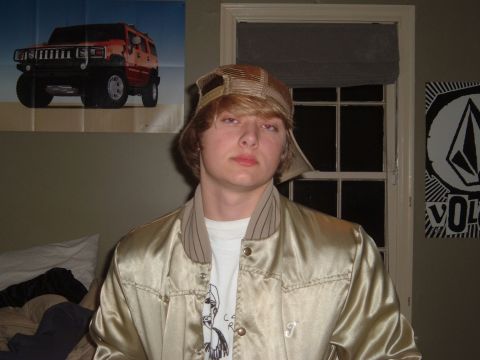 1978 Ford Bronco - A poster of a red Hummer H2 is visible on the wall behind a young person.