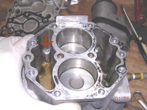 1994 Ford Bronco - After removing the fitings, top plate and cylinder cover plate, this is what I was left with. the arrow points to the lube hole