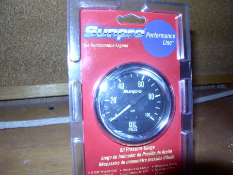 1986 Ford Bronco - Got this SunPro mechanical oil gauge for $5.99 CDN. Wanted a 2 ", but I'll take a 2 5/8" for that price.