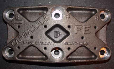 1969 Ford Fairlane - This cast iron part is labeled CAP SADDLE and includes markings for LAKE STREET IRONWORKS and FE.