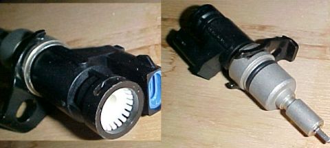 1997 Ford Expedition - A black and silver automotive sensor is displayed from two different perspectives on a wooden surface.