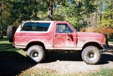 1989 Ford Bronco - This 1989 Ford Bronco is shown in a side profile, a spare tire mounted on the rear.