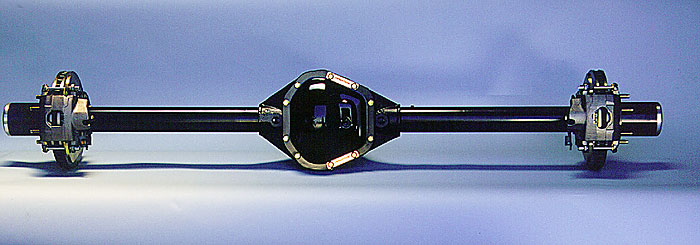 Rear axle assembly with differential housing and axle shafts