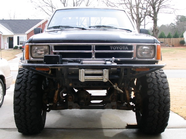 Toyota truck front end with winch and large tires