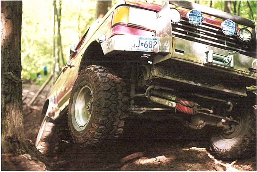 1989 Ford Bronco front quarter view, red, off-roading